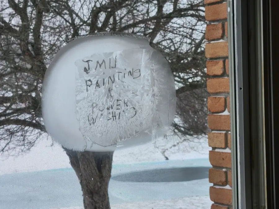 A snowball with the words jml painting written on it